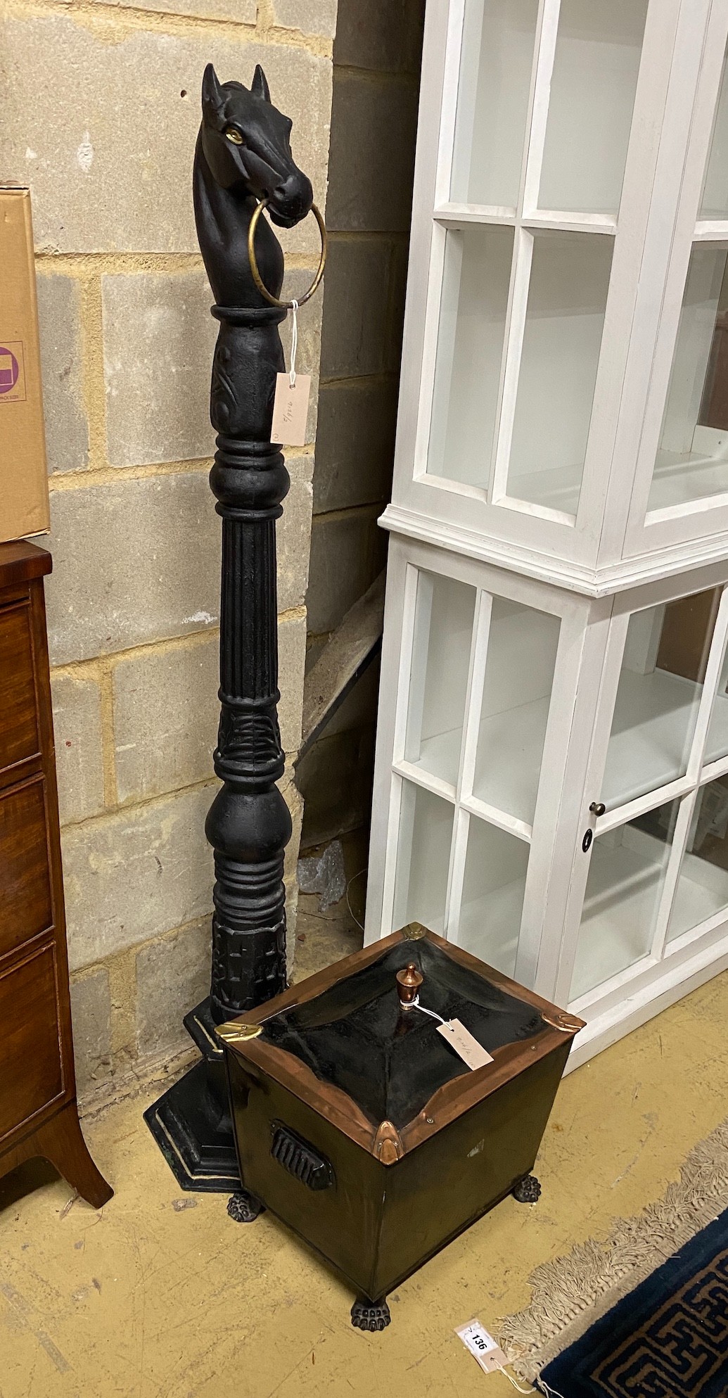 A late Victorian copper and brass mounted coal bin, together with a pair of Victorian brass candlesticks and a cast iron horse tethering post, height 137cm